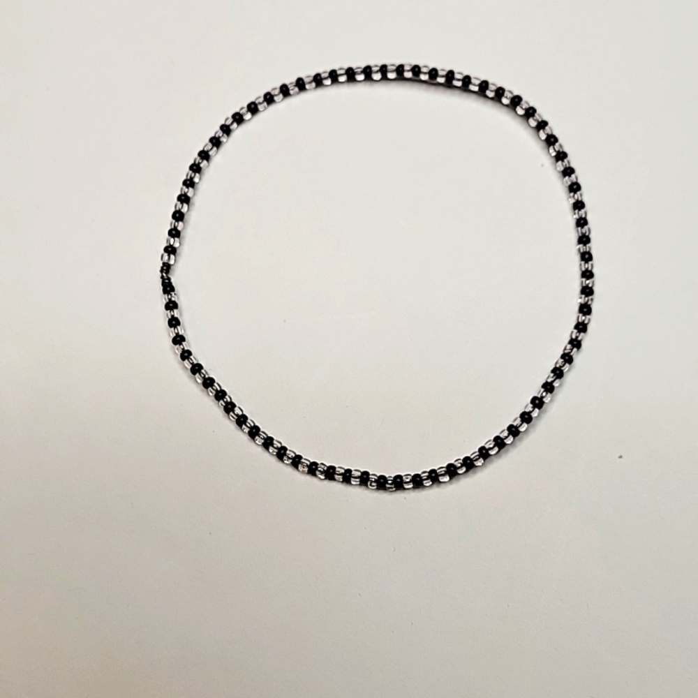 Black and clear beaded bracelet.